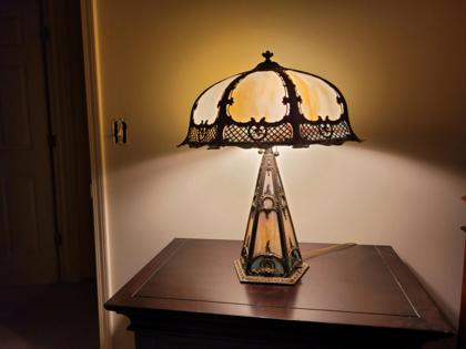 ornate table top lamp with metalwork decorations